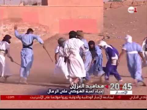 بالفيديو إحياء لعبة الهوكي على الرمال في محاميد الغزلان