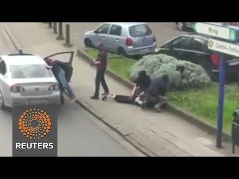 amateur video shows arrest of suspect in brussels