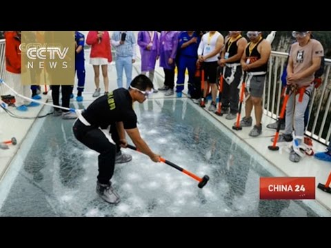 visitors hit world’s highestlongest glass bridge with hammers to test sturdiness