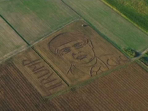 giant trump portrait in italian field