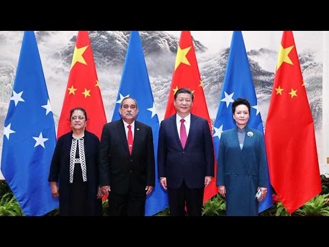 meets micronesian counterpart in beijing