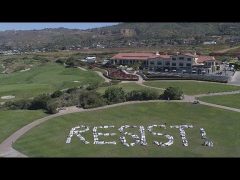 activists spell out resist on trump golf course