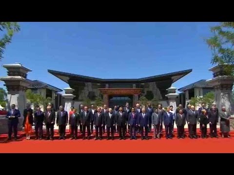 world leaders have group photo taken after fruitful summit