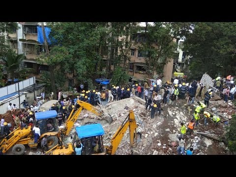 30 feared trapped in mumbai building collapse