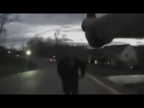 officer holds fire as suspect