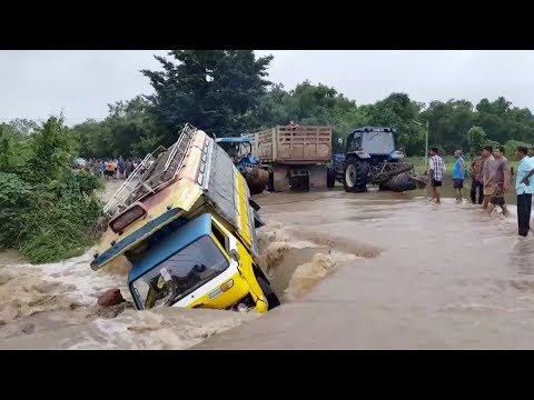 bus washes off road