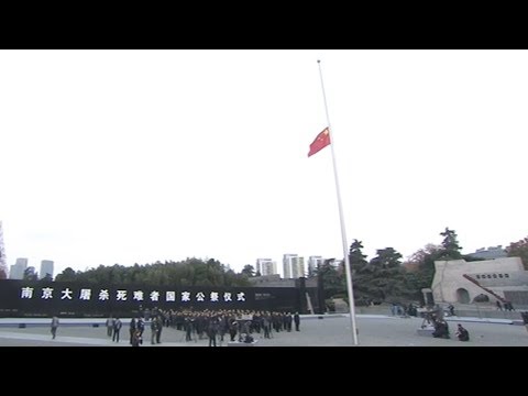 chinese flag at halfmast