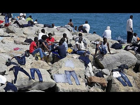 migrants refuse to go away as french police prevent them