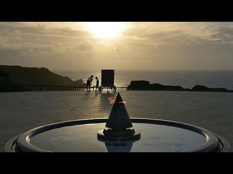 abe faces angry mourners at okinawa commemoration