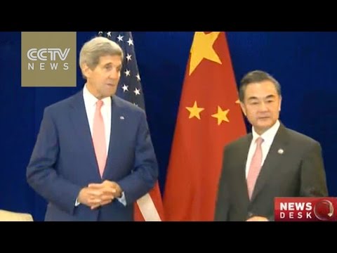 fm wang yi meets john kerry in kuala lumpur