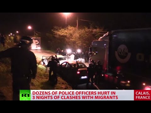 police clash with migrants in calais