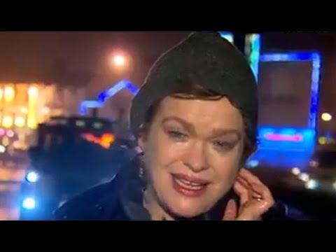 reporter covering storm blows