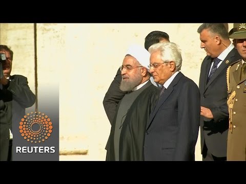 irans rouhani arrives in italy in first trip abroad