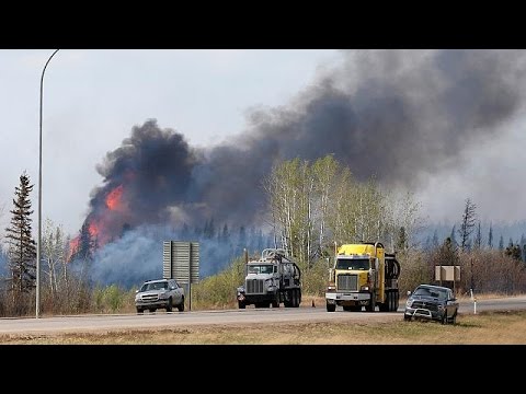 canada firefighters optimistic cooler temperatures will help battle blazing inferno