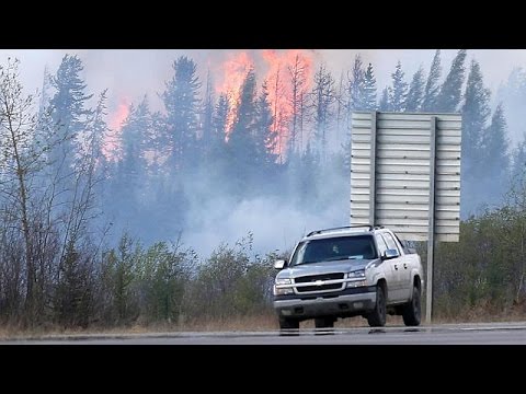 change in weather helps fight canada wildfire