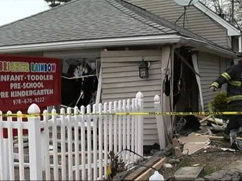 car crashes into mass day care center