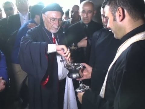 now liberated bishop blesses iraqi church