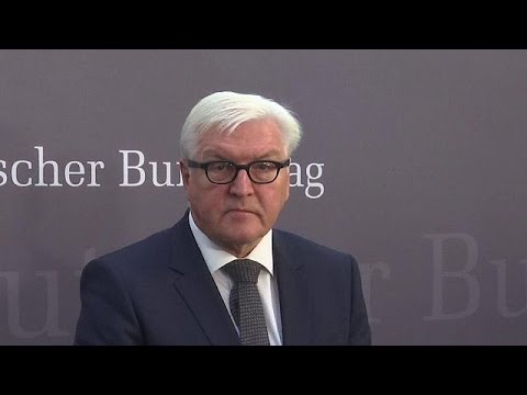 merkel backs foreign minister steinmeier