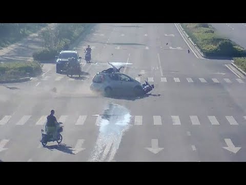 two women land on car roof following road accident