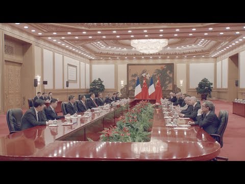 macron meets with xi as china