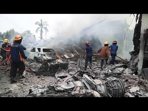 indonesian military plane crashes on houses sumatra