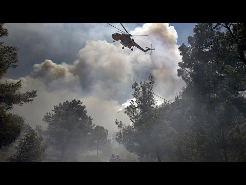 2 arrested as greece fires brought under control