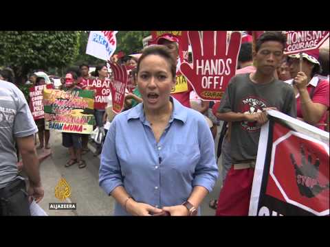 filipino union workers claim government harassment