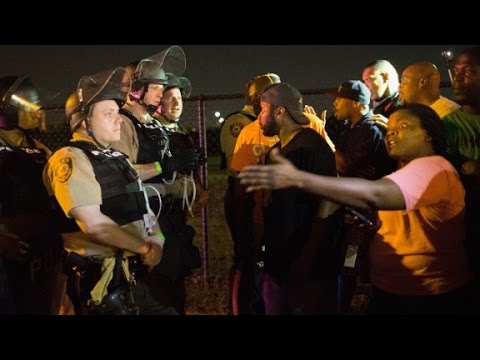 protesters in ferguson threw rocks and bottles