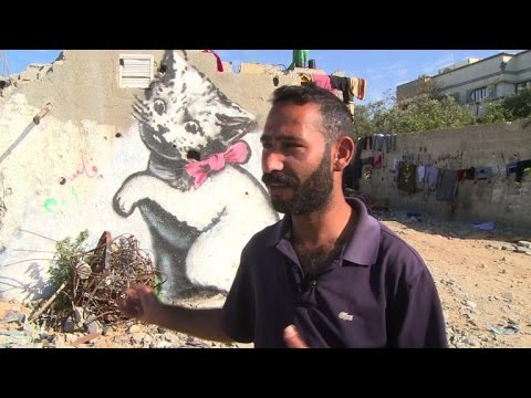 banksy leaves his mark in warravaged gaza