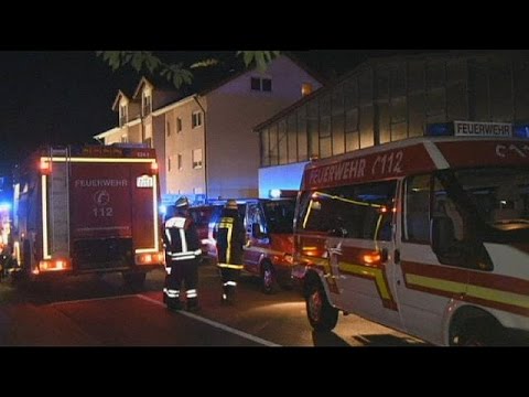 fire tears through refugee shelter in germany