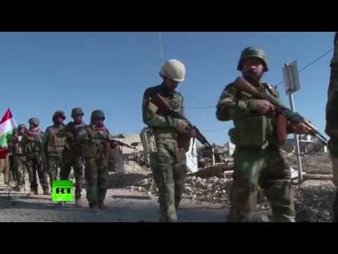 kurdish peshmerga enters sinjar raises flag